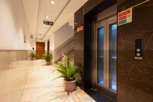 hotel aman suites at igi by arch group