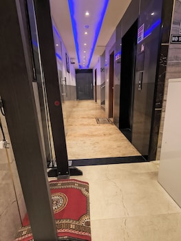 hotel aman suites at igi by arch group