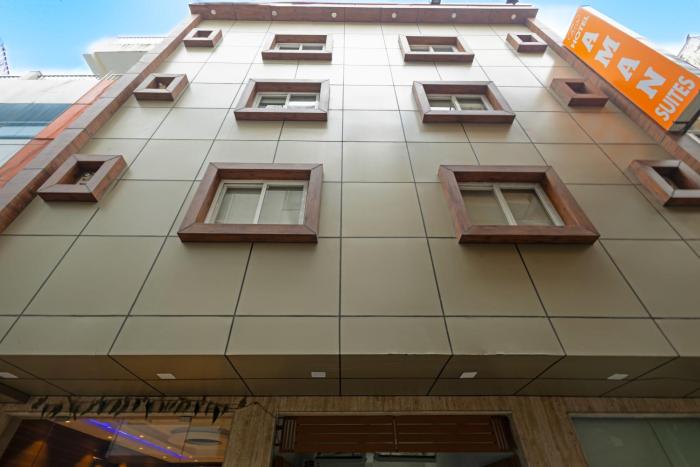 hotel aman suites at igi by arch group