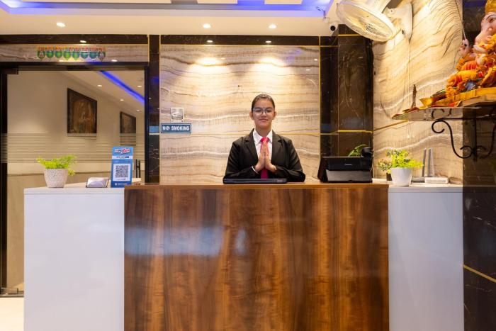 hotel aman suites at igi by arch group