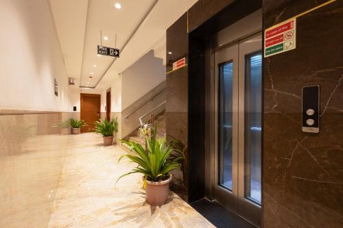 hotel aman suites at igi by arch group
