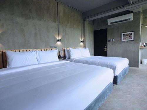 sukhum rajamangala phatthanakan rooms