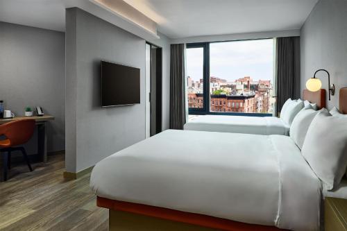 the george at columbia harlem tapestry collection by hilton