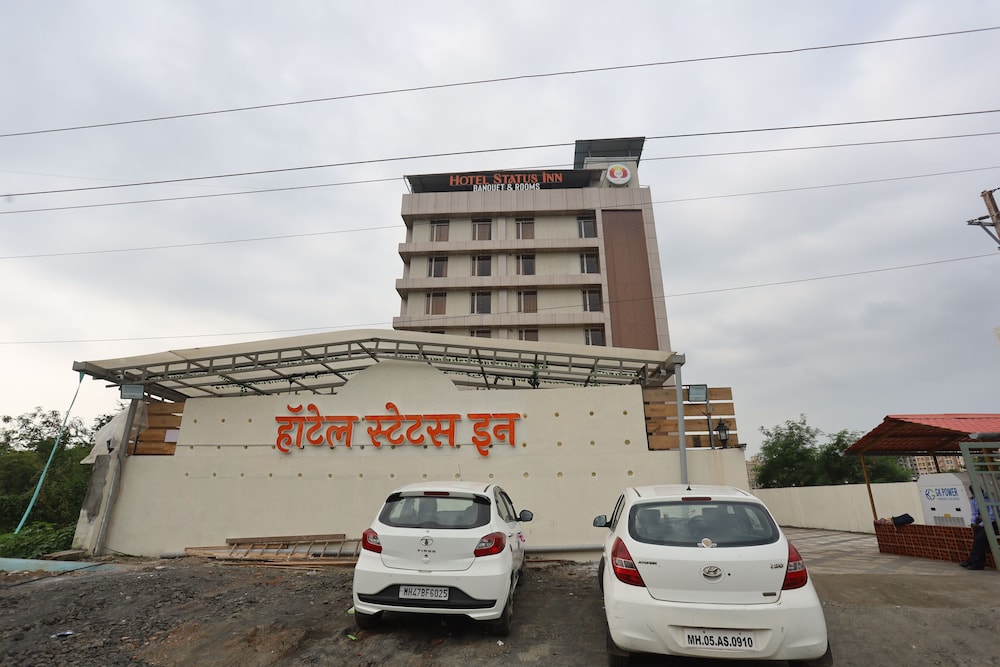 hotel status inn