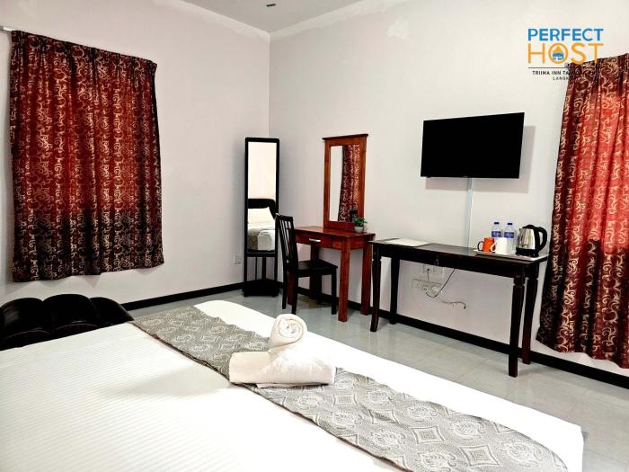 triima inn tanjung rhu by perfect host