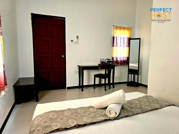 triima inn tanjung rhu by perfect host