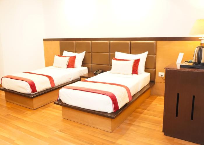 embassy inn sector 19 noida