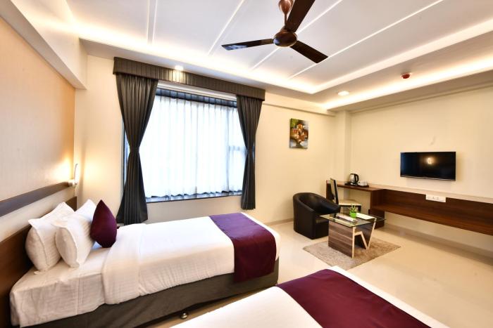 click hotel sagar plaza chakan pune
