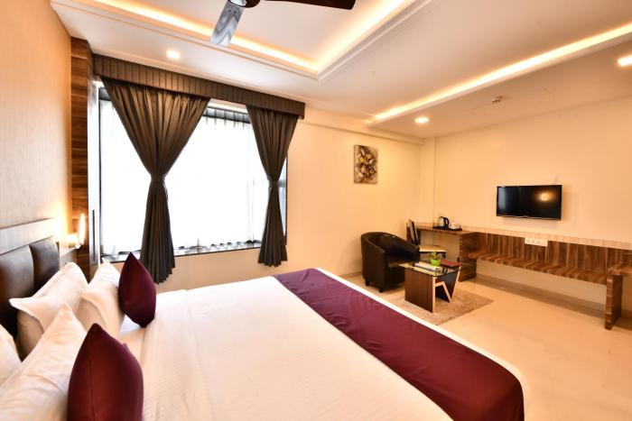 click hotel sagar plaza chakan pune