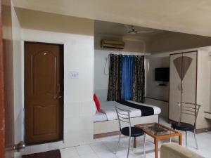 Hotel O Gandharva Inn,Balaji Hospital Complex,Nagar Road Near Bypass,Kharadi,Pune,Maharashtra,411014,India,4 star