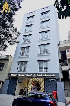 hotel noble nook 100 ft road indiranagar