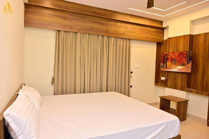 hotel noble nook 100 ft road indiranagar