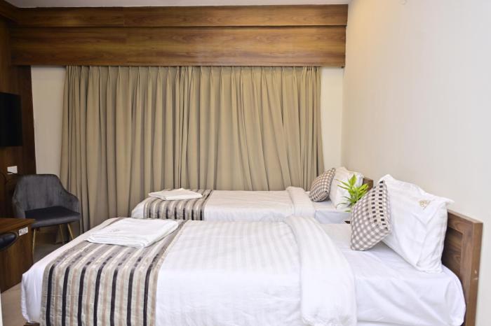 hotel noble nook 100 ft road indiranagar