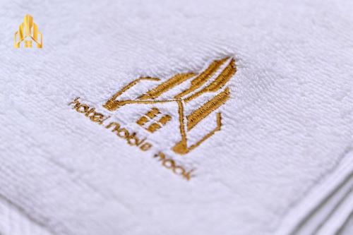 hotel noble nook 100 ft road indiranagar