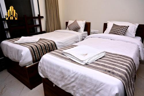 hotel noble nook 100 ft road indiranagar