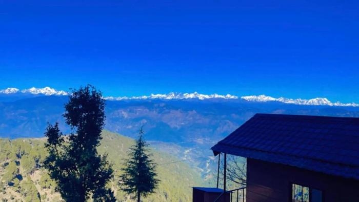 navira hills cottages kanatal