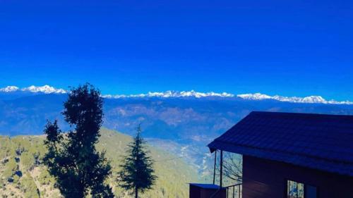 navira hills cottages kanatal