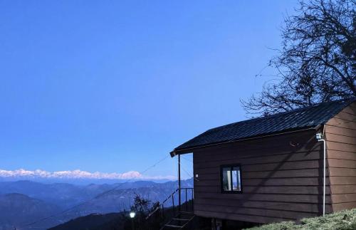 navira hills cottages kanatal
