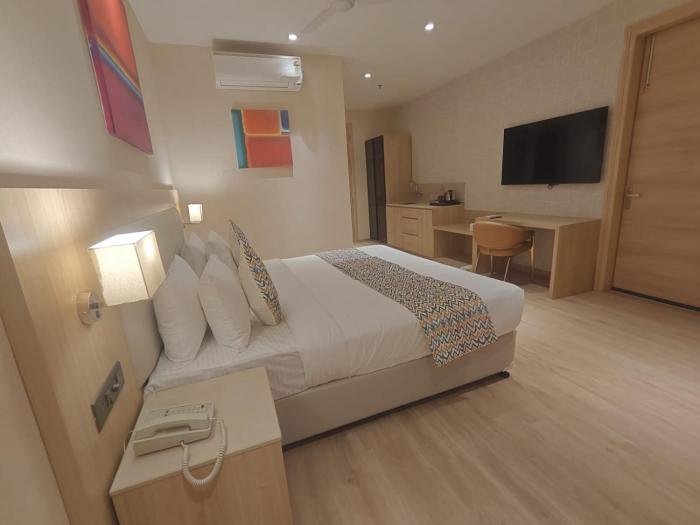 hotel bluestone prime nehru place by the cosy hotels