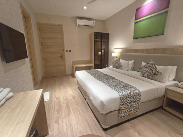 hotel bluestone prime nehru place by the cosy hotels
