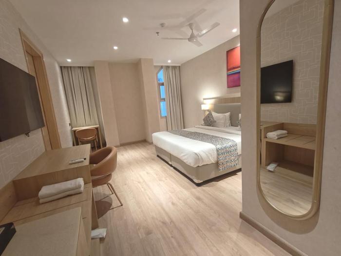 hotel bluestone prime nehru place by the cosy hotels