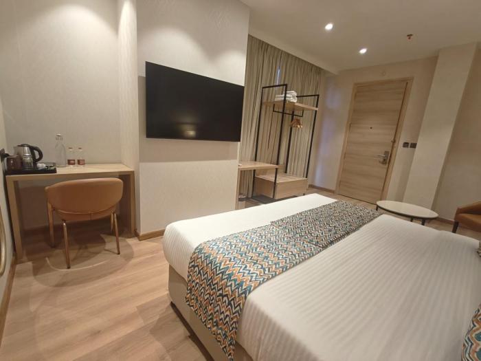 hotel bluestone prime nehru place by the cosy hotels