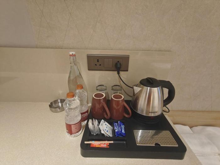 hotel bluestone prime nehru place by the cosy hotels