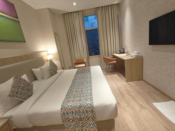 hotel bluestone prime nehru place by the cosy hotels