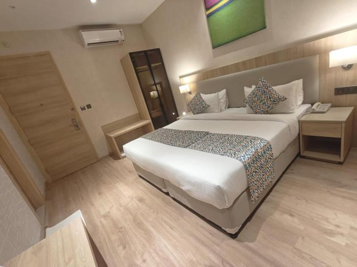 hotel bluestone prime nehru place by the cosy hotels