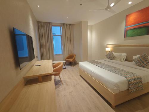 hotel bluestone prime nehru place by the cosy hotels
