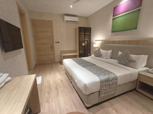 hotel bluestone prime nehru place by the cosy hotels