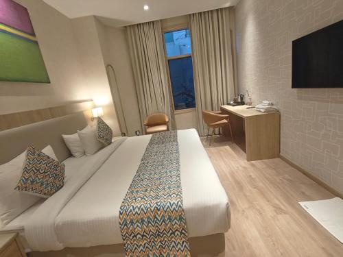 hotel bluestone prime nehru place by the cosy hotels