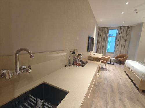 hotel bluestone prime nehru place by the cosy hotels