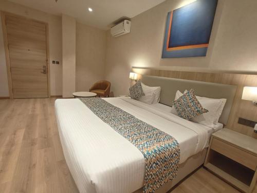 hotel bluestone prime nehru place by the cosy hotels