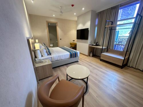 hotel bluestone prime nehru place by the cosy hotels