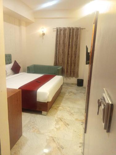 acuotel inn minakshi