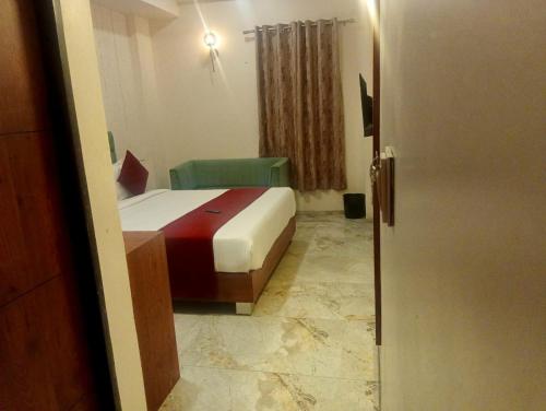 acuotel inn minakshi