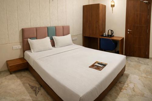 acuotel inn minakshi