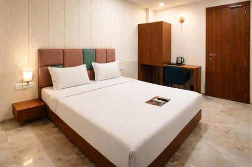 acuotel inn minakshi