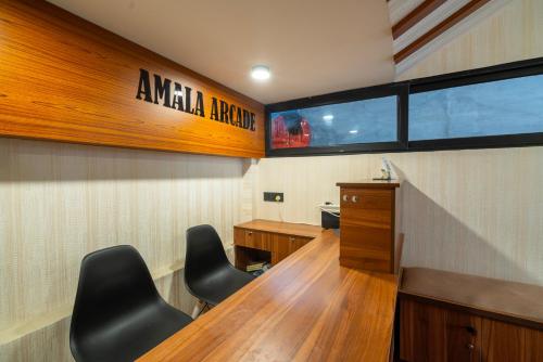 amala arcade ac rooms