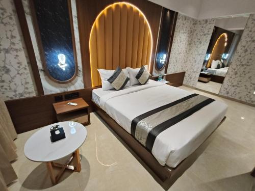 hotel saffron grand thane