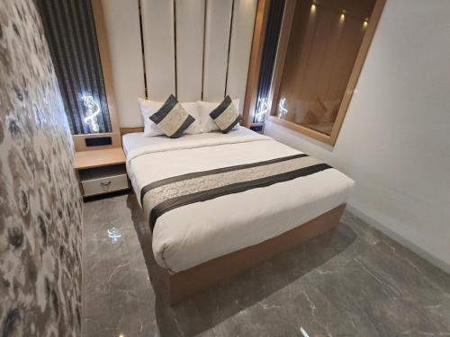 hotel saffron grand thane