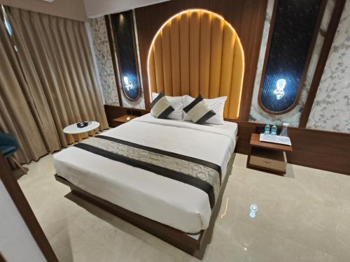 hotel saffron grand thane