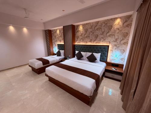 hotel saffron grand thane