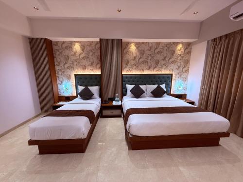 hotel saffron grand thane