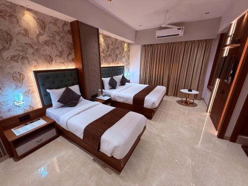 hotel saffron grand thane