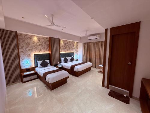 hotel saffron grand thane