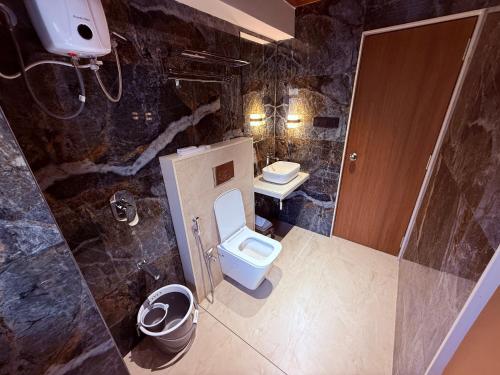 hotel saffron grand thane