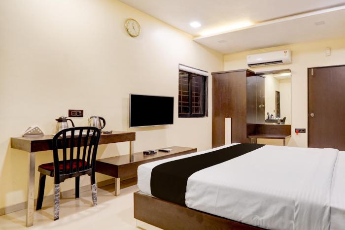 super collection o vyara railway station formerly crystal guest house