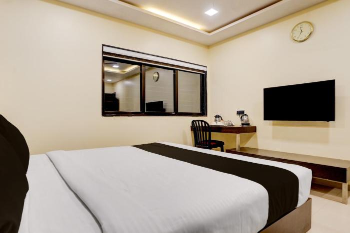 super collection o vyara railway station formerly crystal guest house